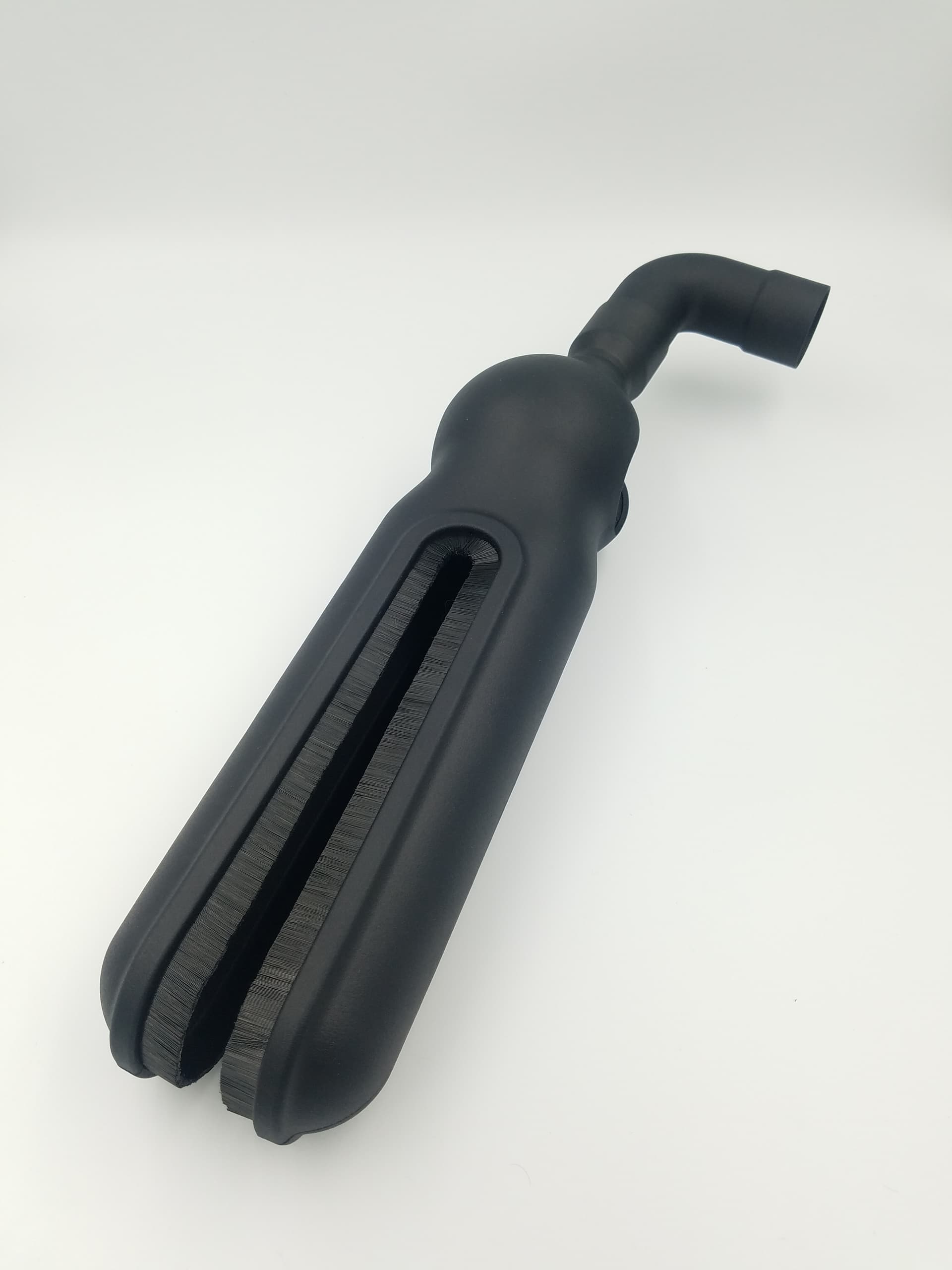 Vacuum Cleaner Attachment Having A Concave Vacuum Head With A Swivel Joint That Swivels Only Within A Central Plane Of The Vacuum Head - Image 5